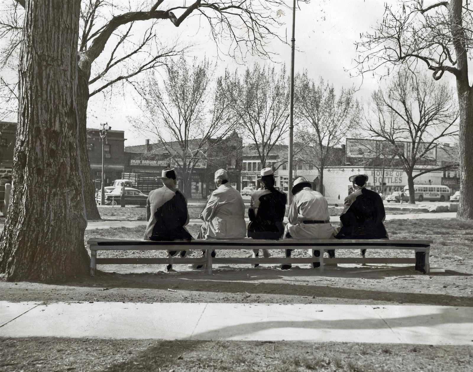 Vintage image of people sitting on a bench in Jefferson Square Vintage image of people sitting on a bench in Jefferson Square